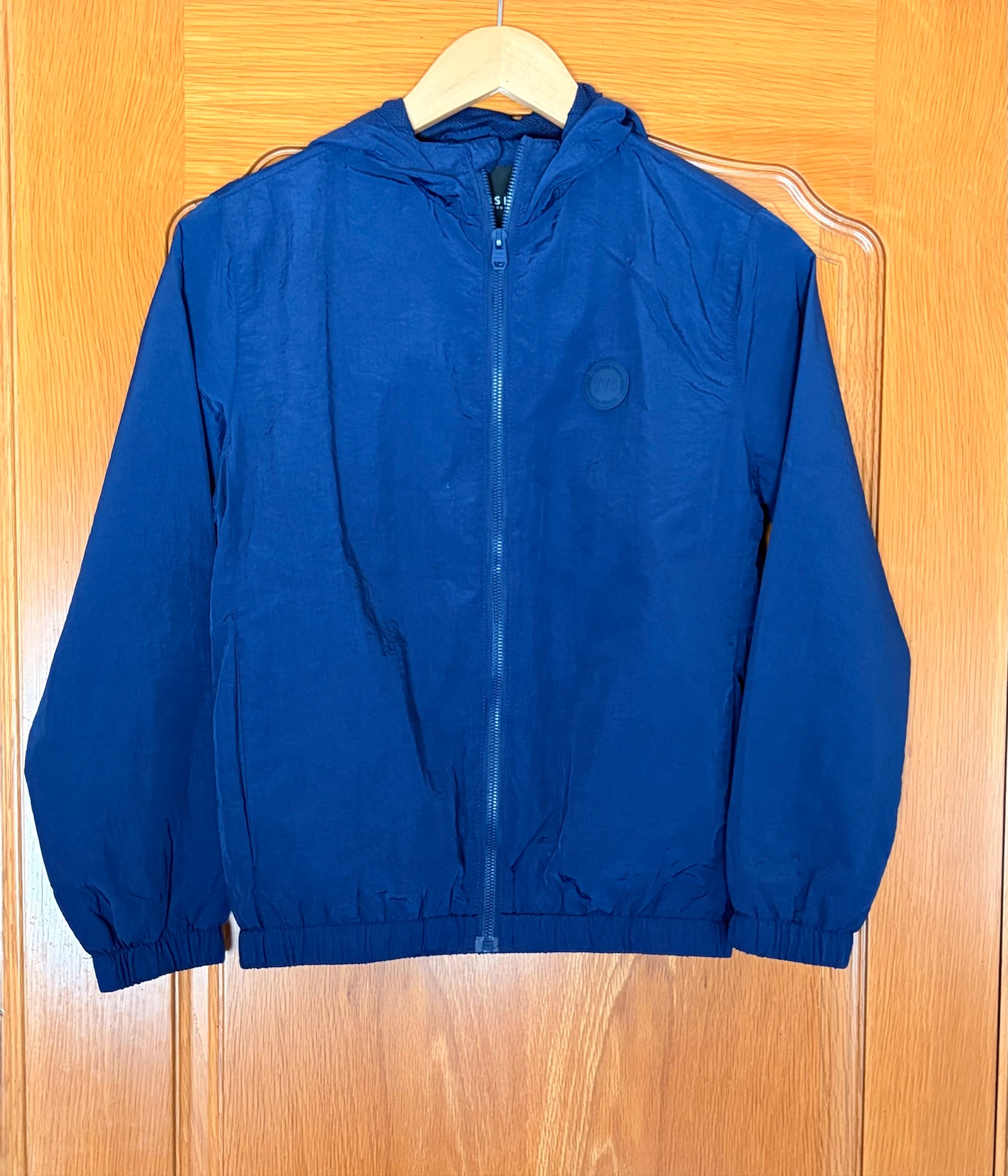 Chaqueta cortavientos con capucha XXS